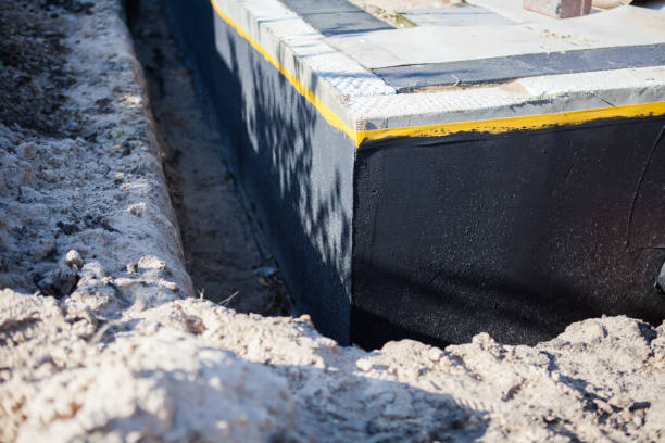 Professional Waterproofing technician working in Red Hill, PA